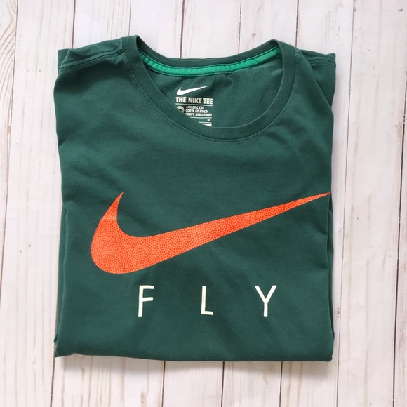 green and orange nike shirt
